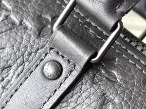 LOUIS VUITTON KEEPALL BANDOULIÈRE 25 BAG TAURILLON MONOGRAM - WLM555